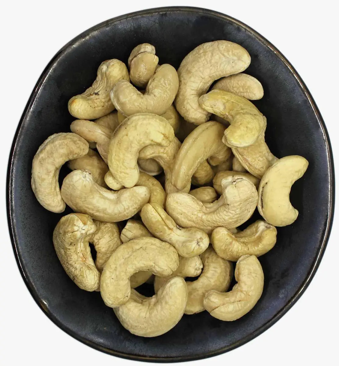 Bowl of premium whole cashew nuts with rich buttery texture