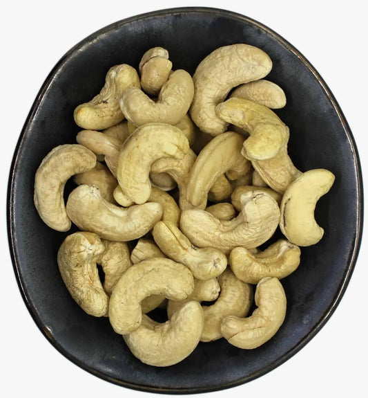 Bowl of premium whole cashew nuts with rich buttery texture