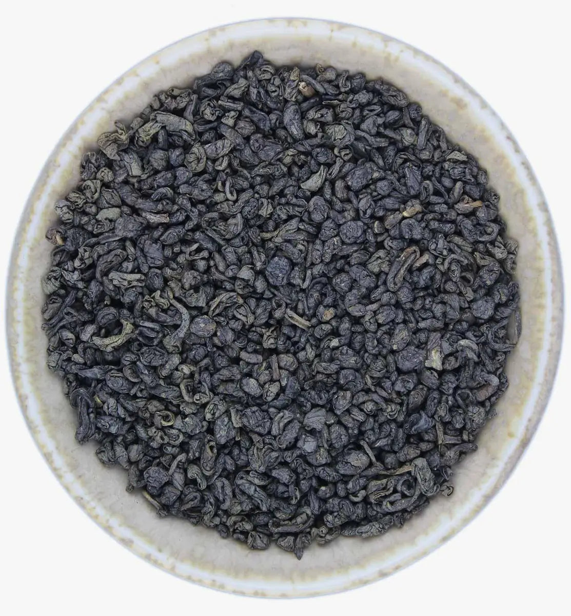 Gunpowder green tea loose leaves rolled into tight pellets with rich green smoky aroma