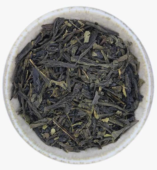 Premium Sencha green tea leaves with vibrant green color for refreshing flavor